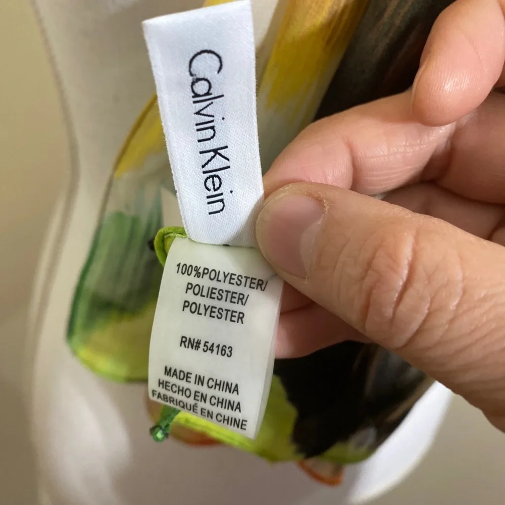 NWT Calvin Klein || woman’s multicolor scarf .L70”W14”